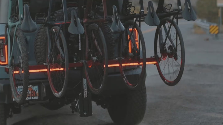 Video of illuminated light bar on hitch mounted bike rack with right blinker engaged.